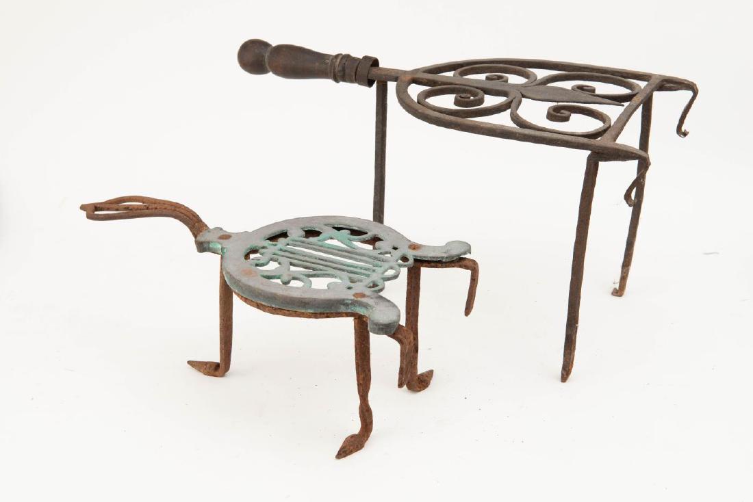 (2) FIREPLACE FOOTMAN TRIVETS (1 of 3)