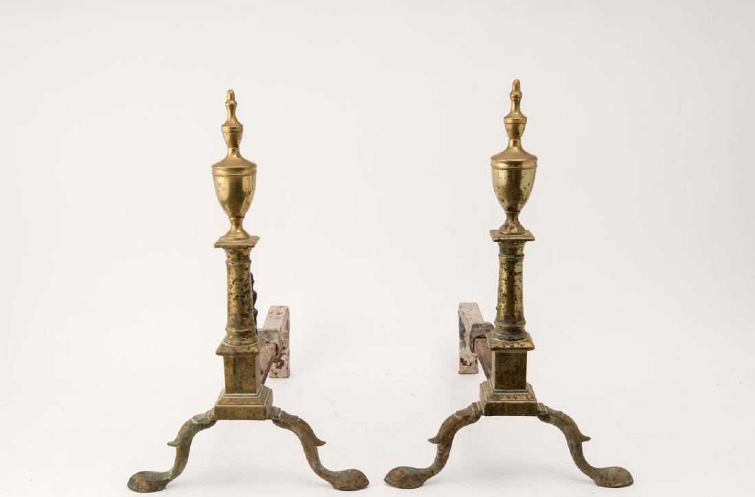FEDERAL PERIOD STEEPLE TOP ANDIRONS: Square stepped base, spurred cabriole legs, slipper feet and conforming stops. 21 1/4 x 16 1/2 inches.