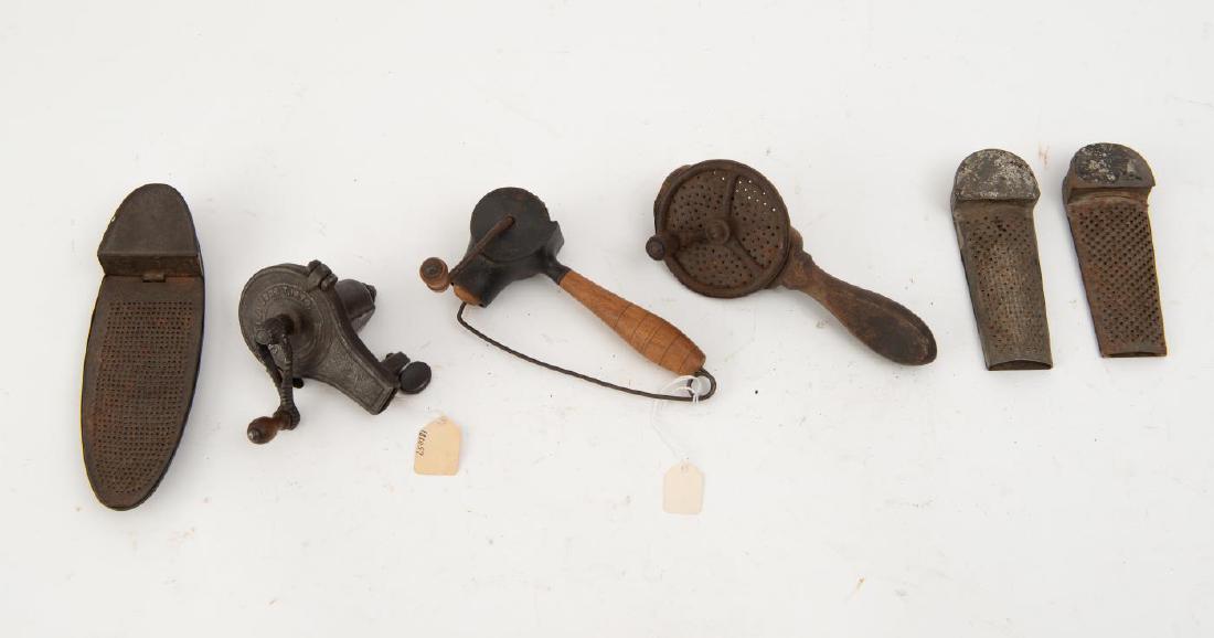 SIX (19th c) NUTMEG/ SPICE GRATERS: Including: Rare cast iron grater with wooden handle in balloon form with hinged brass door which opens to grater. "Patented June 7, 1870" 4 x 3 inches. Together with (5) primitive examples including (