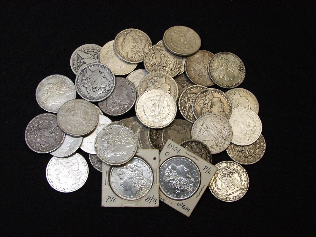 (45) UNTITED STATES MORGAN SILVER DOLLARS: A nice selection of dates and mintmarks; 38.035 Troy ounces