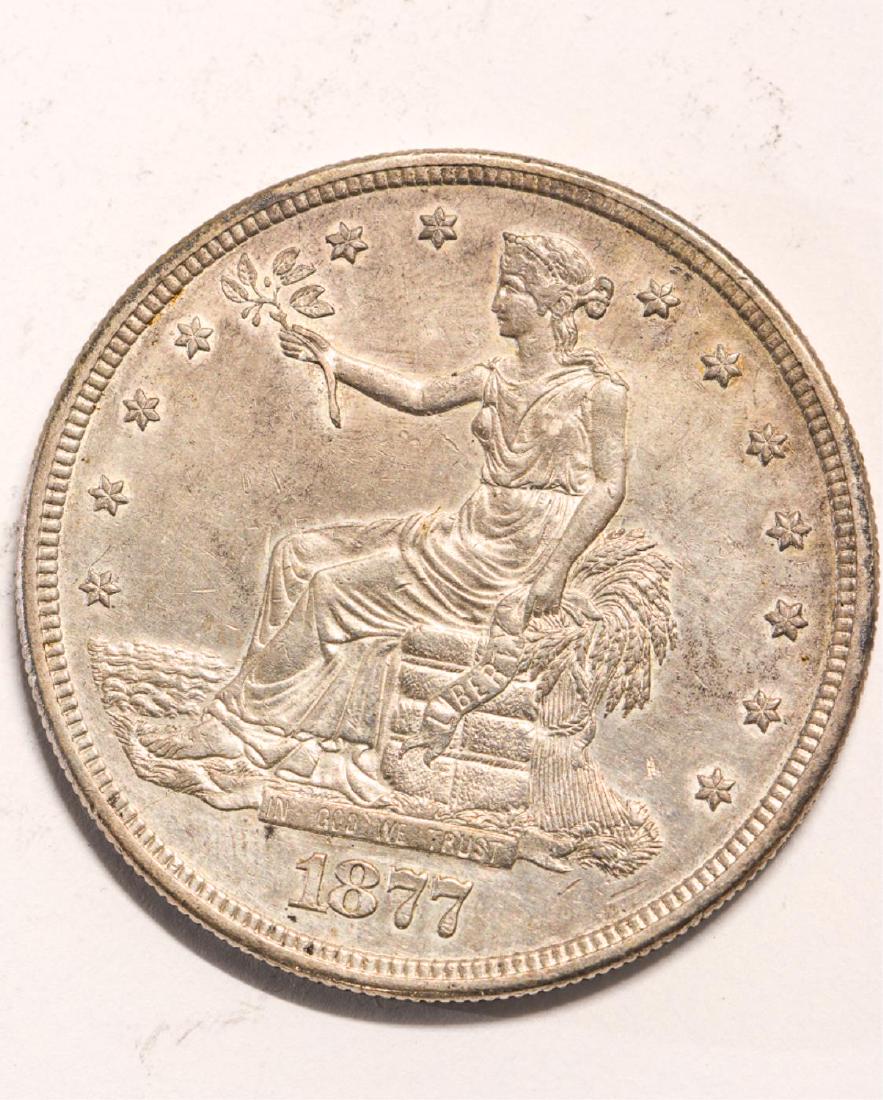 1877-S UNITED STATES TRADE DOLLAR: Nice uncirculated example of a popular type. Includes old collector ticket; 0.875 Troy ounces