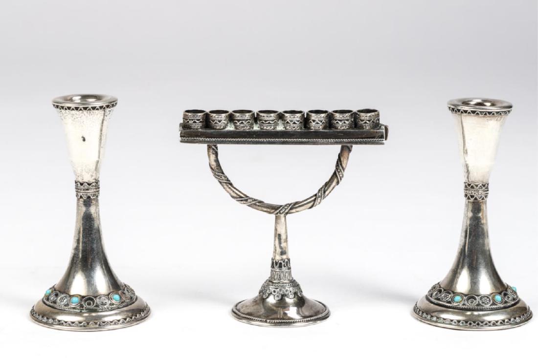 PAIR OF ZADOK STERLING CANDLESTICKS & MENORAH: Candlesticks with silver filigree and set with jade cabochon. Menorah marked 925. 4 inches (candlesticks) 3.23 troy ounces.