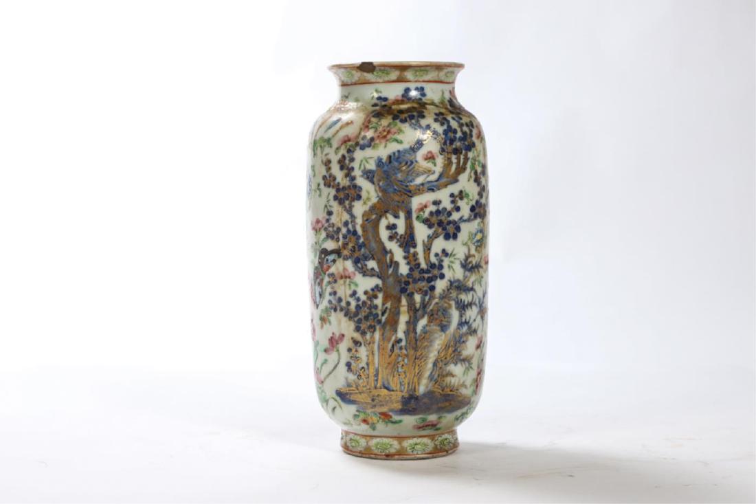 CHINESE ROSE FAMILLE PORCELAIN VASE: Decorated with trees, birds and butterflies which have been highlighted in gold. unmarked. 9 inches.