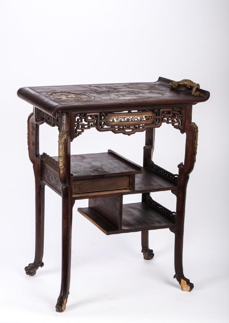 CHINESE ETAGERE STAND with BRONZE DRAGON & INLAYS: (3) Tiers of shelves and drawer. Dragon lies on tray-top inlayed with ivory and abalone flowers birds and butterflies, pierced and gilt apron, ormolu mounted legs with lion paw feet.