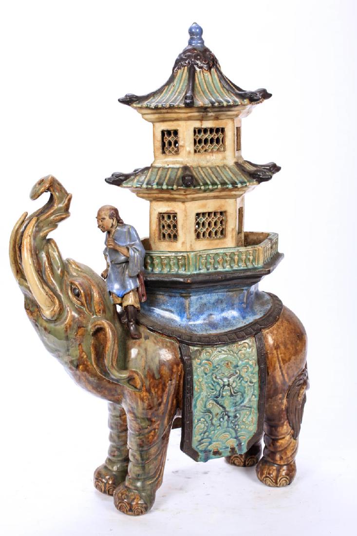 CHINESE GLAZED EARTHENWARE ELEPHANT with HOWDAH: Unmarked. 26 1/2 x 18 x 7 inches.