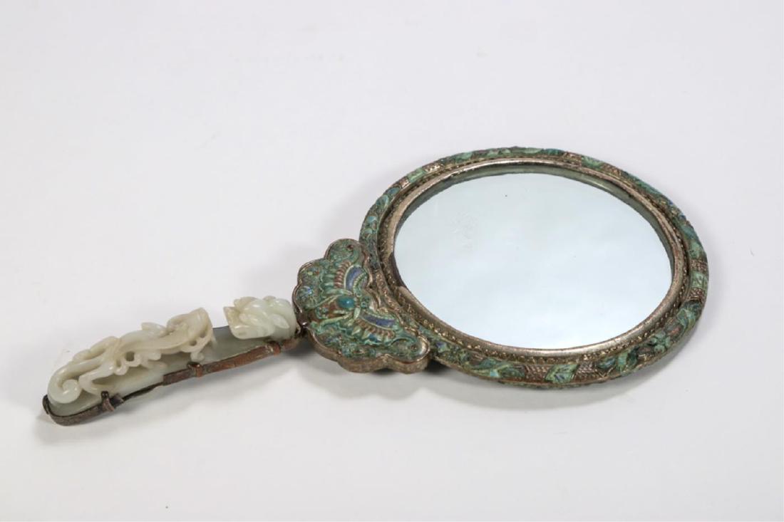 CHINESE WHITE JADE BELT HOOK: Incorporated into a handle for a hand mirror. Celadon cast to the white jade which is carved with a dragon head and baby dragon. 13 1/4 inches overall. Belt hook measures 5 inches.