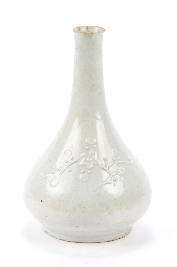 EARLY ASIAN GLAZED EARTHENWARE BOTTLE VASE: With raised peach blossom and bamboo leaf motifs. unsigned. 11 inches.