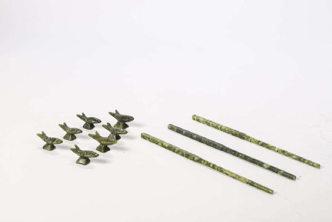 SET OF (22) SPINACH JADE CHOP STICKS and (7) RESTS: Chop sticks 8 3/4 inches. Fish-form rests 1 1/2 inches.