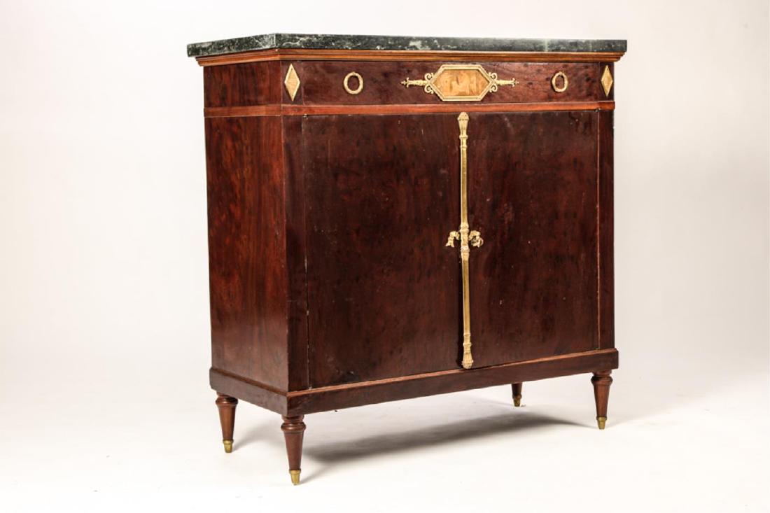 FRENCH REGENCY STYLE SERVER: Mahogany veneer case with ormolu mounts. Marble top, single long (2) pull drawer with figural neo-classical marquetry frieze.(2) Cabinet doors open to (2) shelves. Turned legs with bronze ferrules.