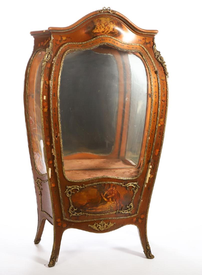 LOUIS XV STYLE VERNIS MARTIN VITRINE: Bombe case trimmed with ormolu mounts of acanthus leaves, scrolled swags and flora. Hand painted panels depict cherubs, flora and artistic motifs. 70x 40 x 17 inches.