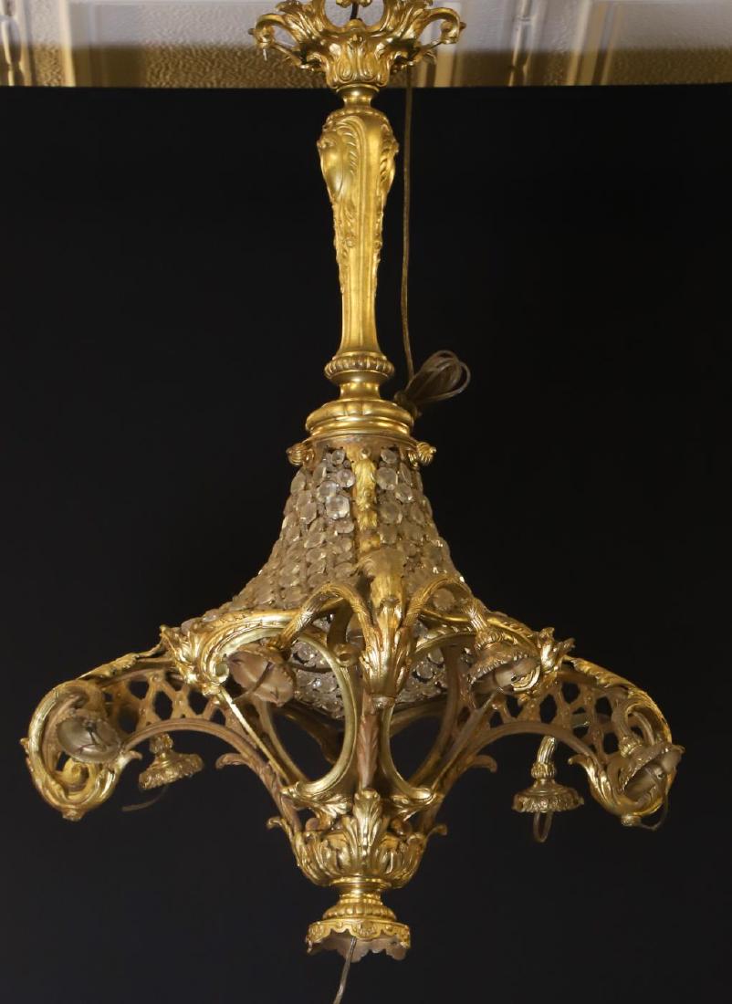 FRENCH (7) LIGHT GILT CAST BRONZE CHANDELIER: Art Nouveau (3) arm chandelier with web of lusters holding (2) lights with center drop. 39 inches.