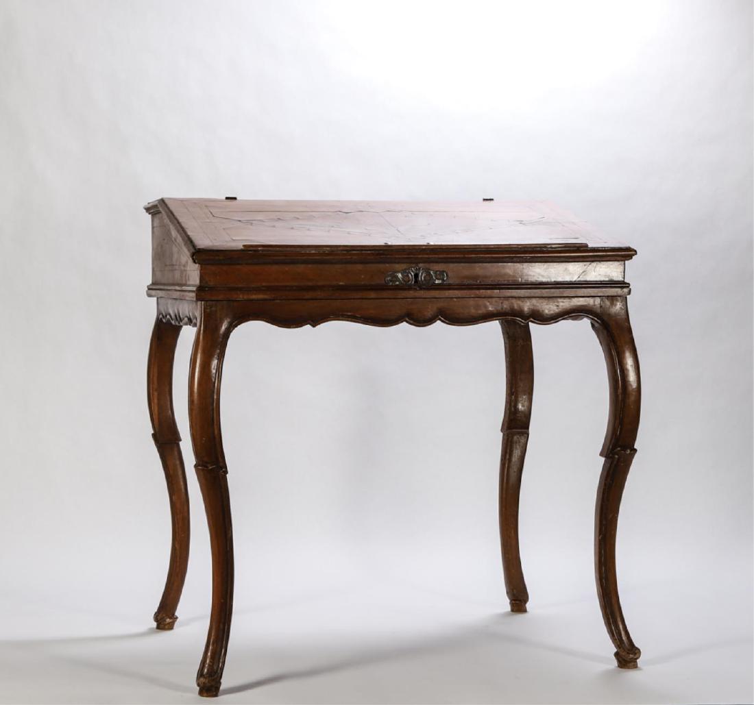LOUIS XV SLANT TOP DESK ON FRAME: Contrasting marquetry veneers and brass string inlay. Top opens to (4) drawers. 33 x 24 x 31 inches.