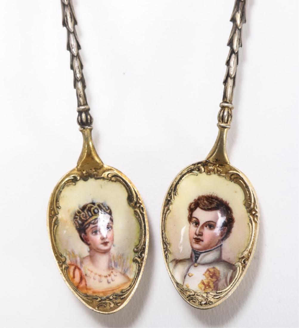 (2) ENAMELLED EUROPEAN SOUVENIER SPOONS: Representing: A Young Royal Couple with gold wash and eagle tipped handle. (approx. 5 inches)