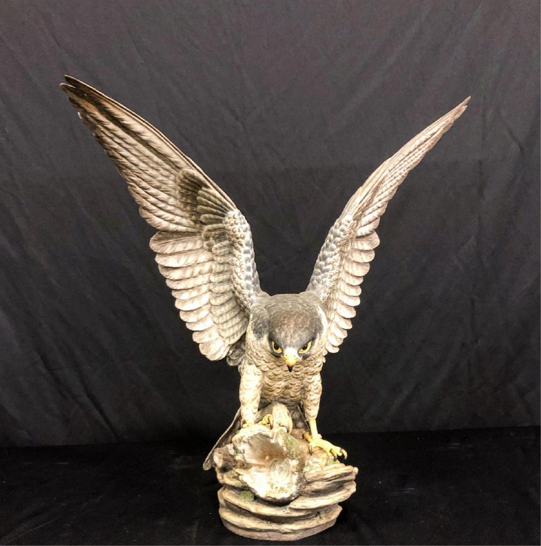 BOEHM BONE CHINA “RAPTOR”: Signed on rock and under base. 21 x 20 x 10 inches.