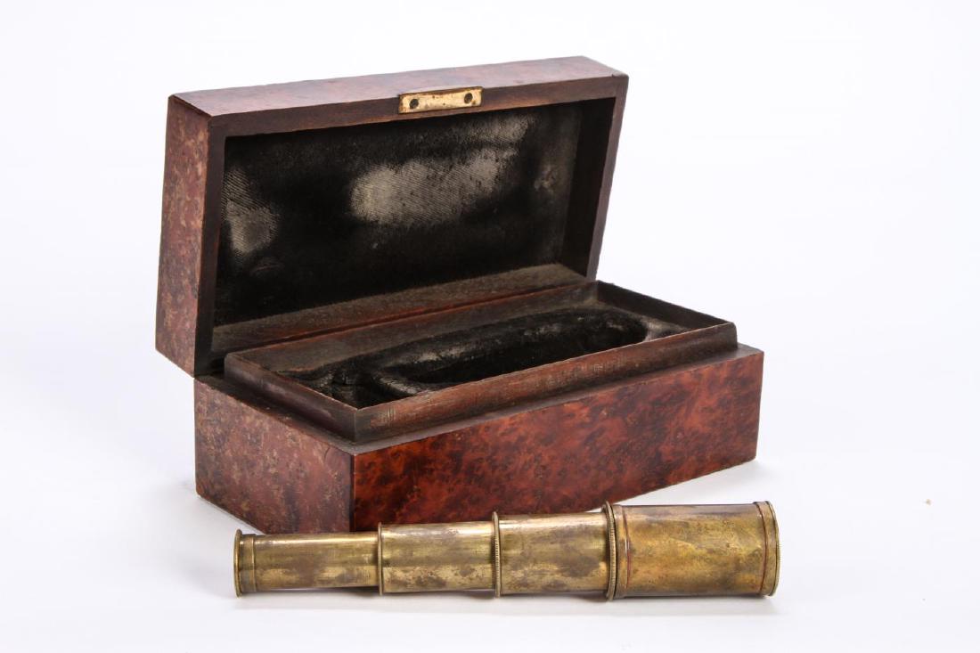 CAPTAIN T.S. DAWSON CASE with POCKET TELESCOPE: Wonderful birdseye and burl wood veneer velvet lined case with engraved bone name plate. 2 1/4 inch telescope unmarked. Box measures 2 3/4 x 7 3/4 x 3 3/4 inches.