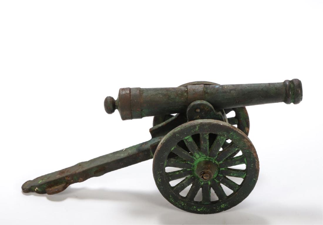 SMALL CAST IRON FIRING CANNON: 9 x 15 1/2 x 6 inches. unmarked