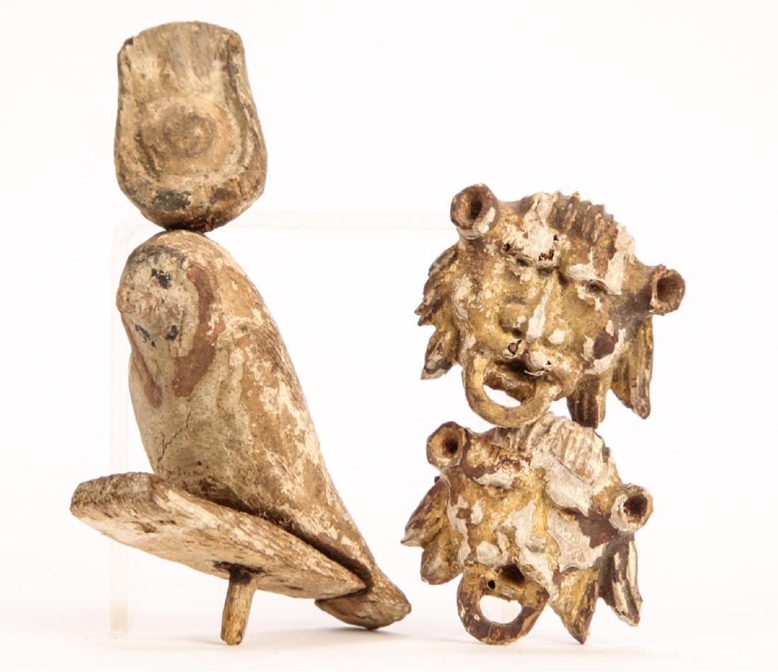 ANCIENT EGYPTIAN CARVED WOODEN FALCON: (1) Flower and (2) carved and gilt lion escutcheons. Falcon measures 2 1/2 x 2 1/2 inches (including peg)