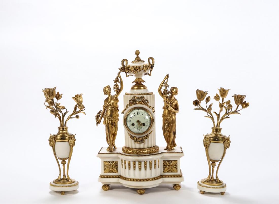NAPOLEON III MARBLE AND DORE GARNITURE SET: convex dial signed, Planchon, figural with three-light candelabras, clock: 20”