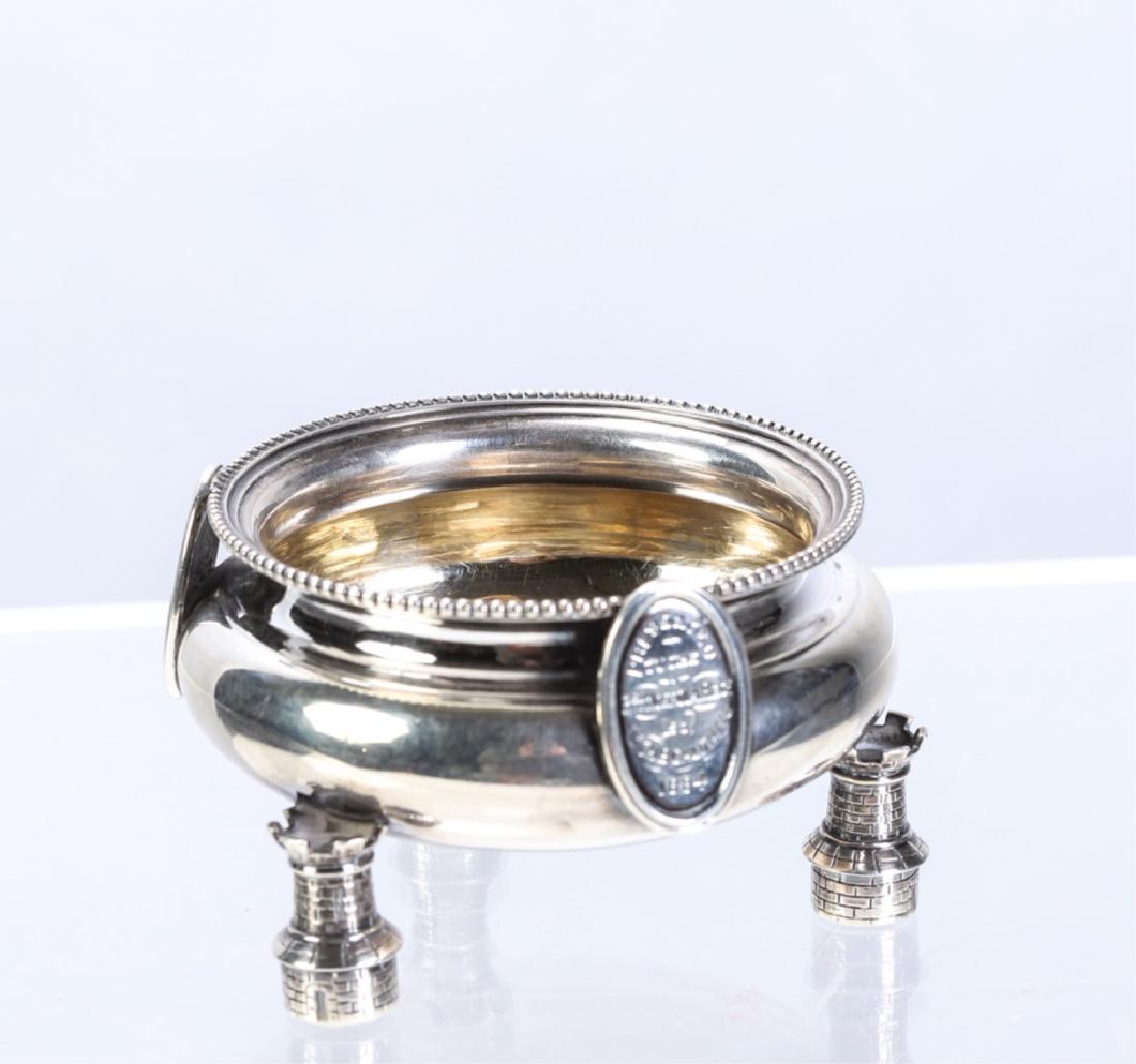 H TESSIER STERLING SILVER REGIMENTAL PRESENTATION: Master salt with beaded rim, (3) rook-form feet and (2) medallions engraved "Peace" and "Presented to the 3rd Norfolk Regiment by Ch. E. Caldwell 1884". Beneath is engraved "Henry Tessier Court Jewele