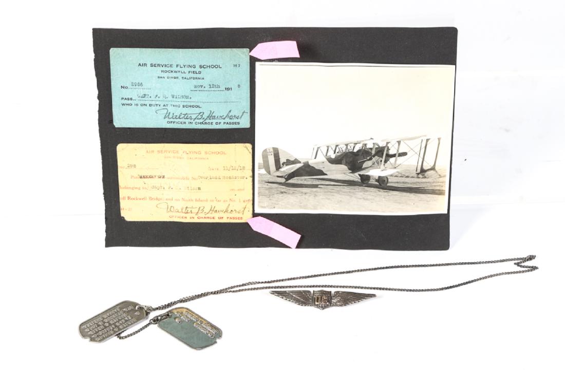PILOT FRANCE Q. WILSON WWI AVIATION MATERIAL: Including: 1918 Air Service Flying School Rockwell Field, San Diego, CA, 1918 Air Service Flying School Automobile Pass, Dog tags from WWI and WWII, WWI Sterling Silver Wings with gold inlay wings eng