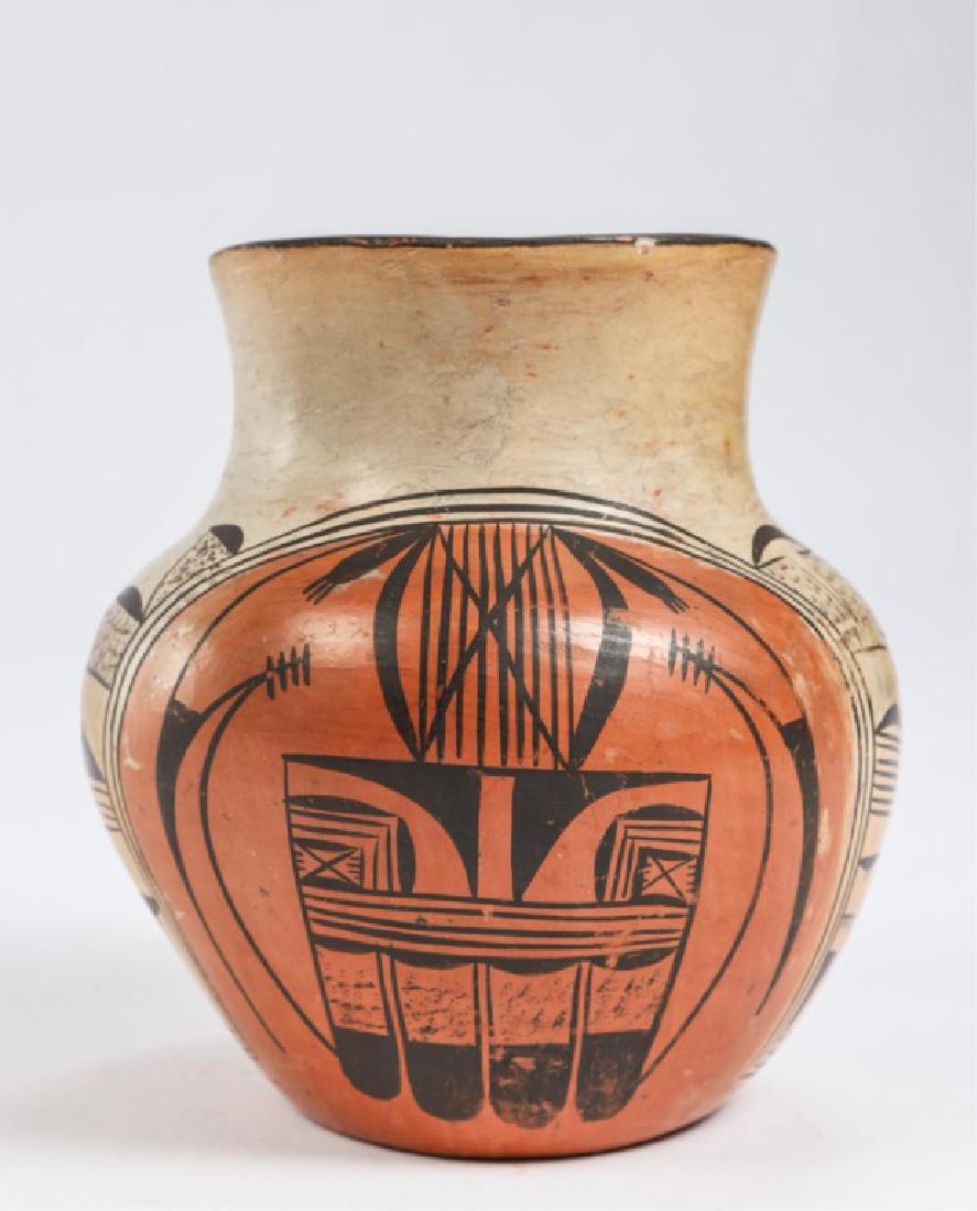SOUTHWESTERN NATIVE AMERICAN JAR POSSIBLY HOPI: Brown geometric patterns on orange and oatmeal slip. redware. 6 x 5 3/4 inches.