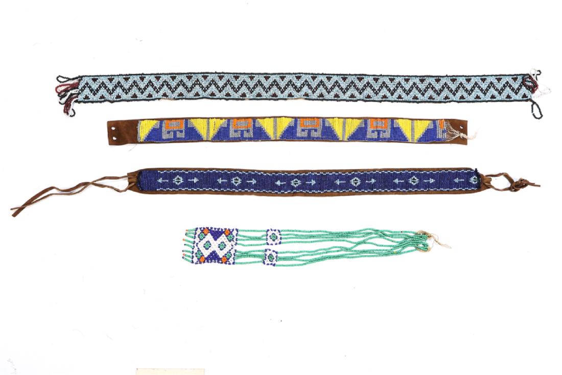 NATIVE AMERICAN BEADED HEADBANDS, BELT & NECKLACE: (4) Pieces: Head bands sewn to 20 inch leather straps, belt backed with 25 inch cloth. Together with a (6) strained necklace with tassels (21 inches not including pendent