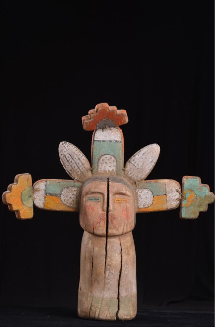 HOPI ANTIQUE COTTONWOOD KACHINA DOLL: Carved and polychrome decorated, three jointed appendages to head, circa 1900, height 15 inches