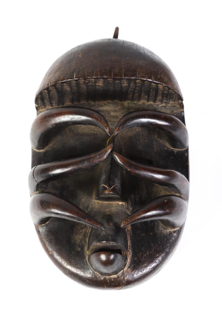 AFRICAN SPIDER MASK BETE TRIBE IVORY COAST: Carved wood. 10 1/2 x 7 x 5 inches.