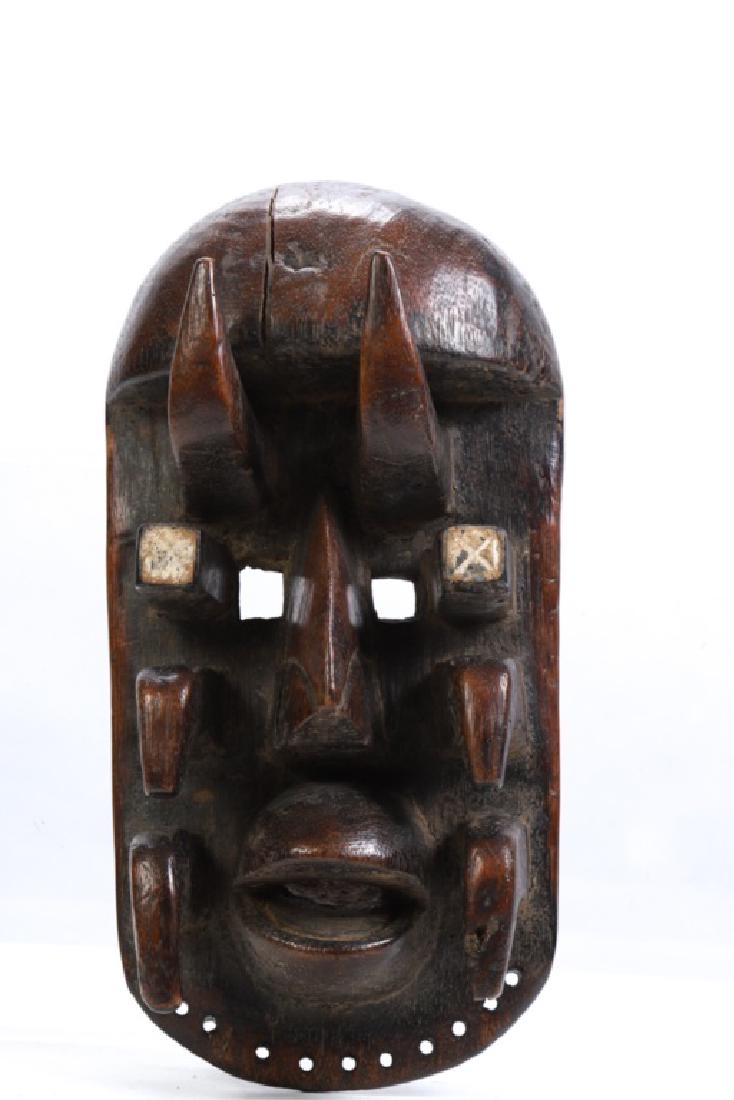 AFRICAN BETE TRIBE WAR DANCE MASK IVORY COAST: Carved and painted wood. 13 1/2 x 7 x 5 inches