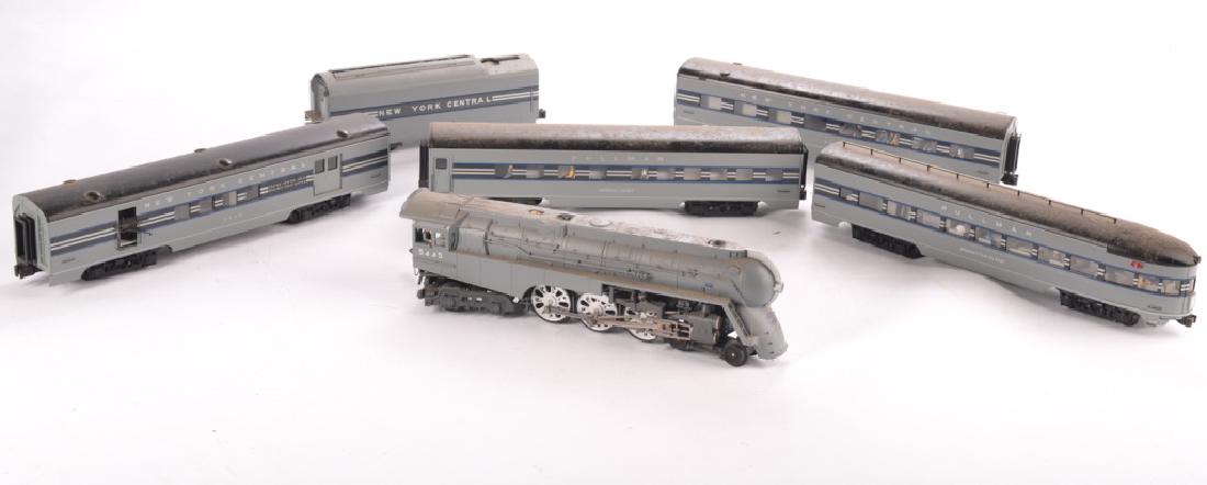LIONEL O-GAUGE NEW YORK CENTRAL TRAIN SET: Bullet train locomotive, tender, and four passenger cars