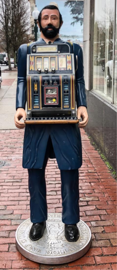 ULYSSES S GRANT CARVED FIGURE MILLS 5-CENT SLOT: Life-size wood carving with original decoration, glass eyes, housing a 1930s Mills, Chicago Five Cent Play, oak sided jackpots slot machine, silver dollar base, 74 x 23 x 18 inches
