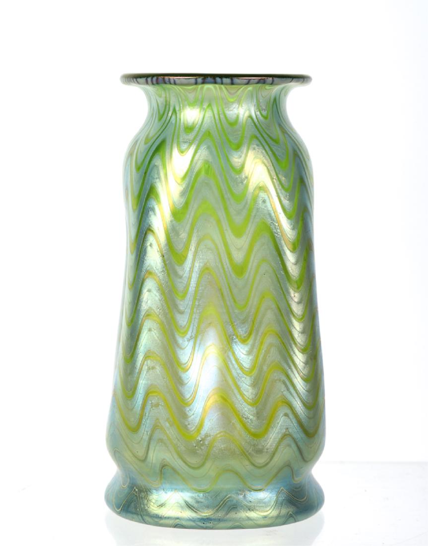 LOETZ AUSTRIA HAND BLOWN ART GLASS VASE: Iridescent vase with pulled wave motif, pinched sides and defined foot. signed. 7 1/2 inches.