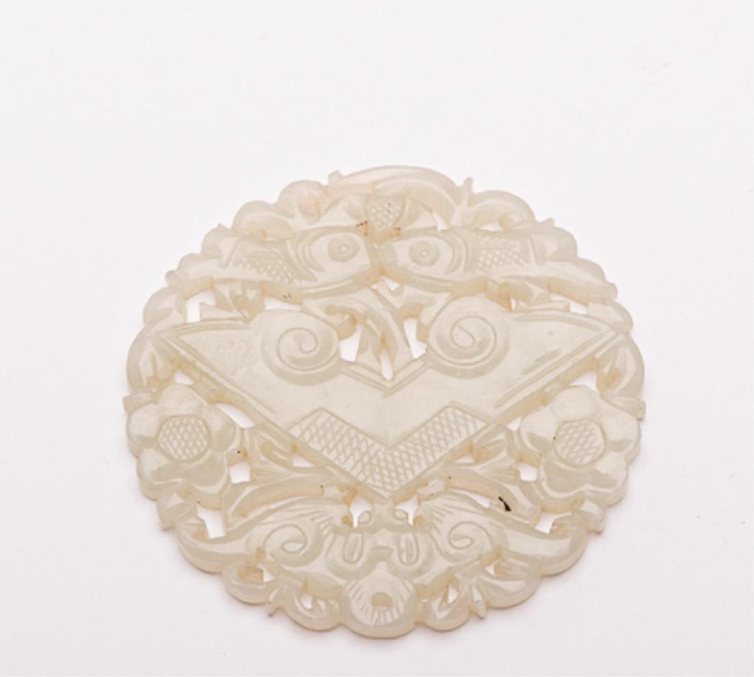 CHINESE CARVED AND PIERCED WHITE JADE PLAQUE: Moth, fish, flowers and bat. 2 inches