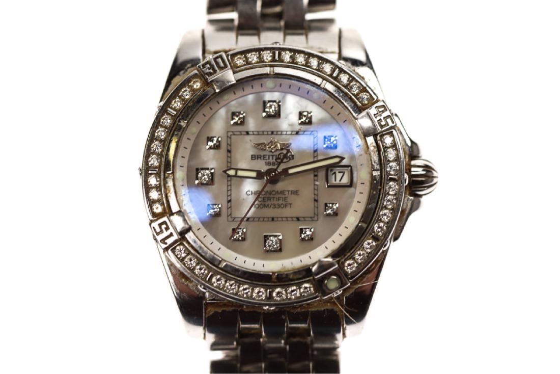 BREITLING WINDRIDER COCKPIT LADIES DIAMOND WATCH: 31 mm mother of pearl and diamond dial. Stainless steel case and band. A71356