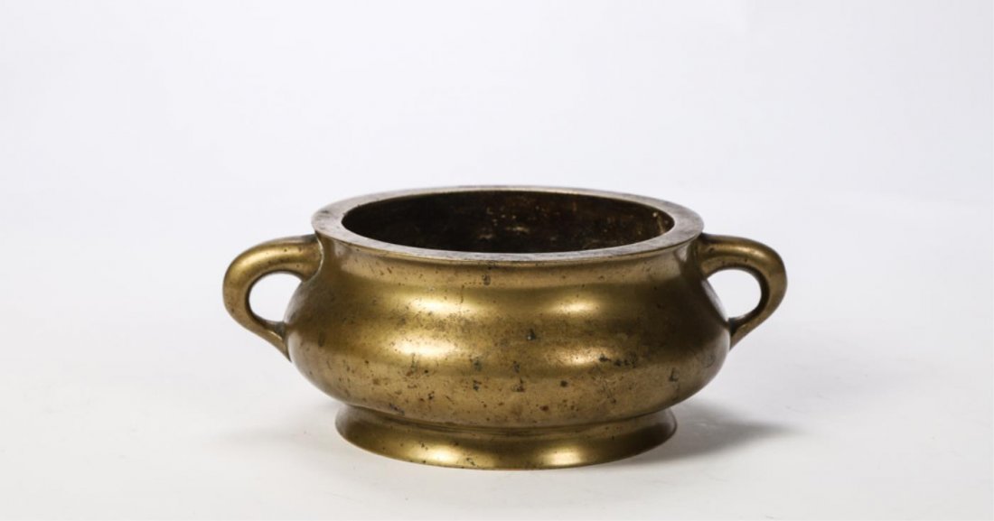 CHINESE BRONZE (2) HANDLED CENSER: Cast with dragon and crane under base. 9 1/4 x 7 1/2 inches.