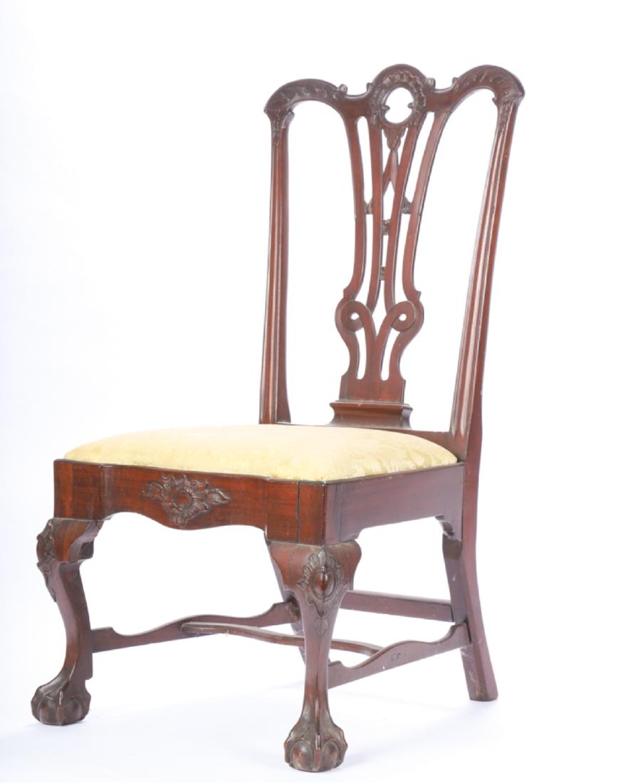 FEDERAL PERIOD CHIPPENDALE MAHOGANY SLIPPER CHAIR: Finely carved crest rail, pierced splat, carved block front apron, carved knees and ball and claw feet. 37 x 21 x 17 inches.