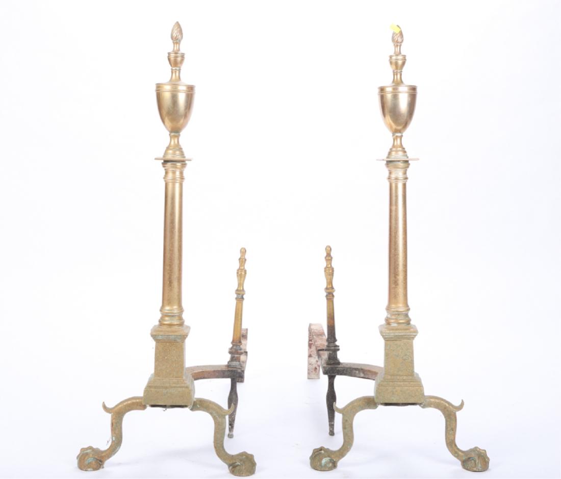 PAIR of PERIOD PHILADELPHIA BRASS ANDIRONS: Urn and flame finials with ball and claw feet and log stops. 33 1/2 x 13 x 30 inches.
