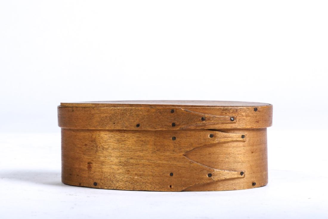 SMALL OVAL SHAKER PANTRY BOX: Finger joint secured with brass tacks. 2 x 5 1/2 x 2 1/2 inches.