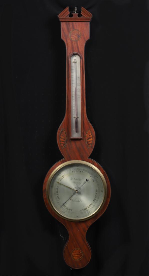 D. GATTY READING MERCURY WHEEL BAROMETER: Silvered dial with case inlaid with marquetry shells. 38 inches.