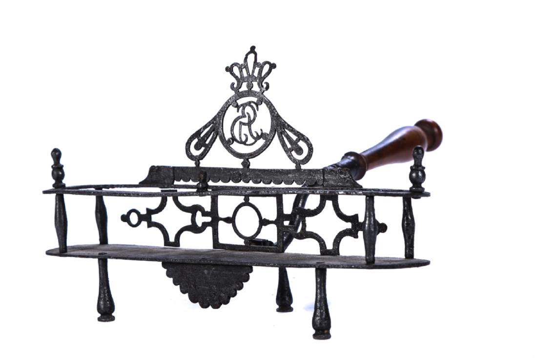 (18th c) FRENCH WROUGHT IRON TOASTER: Turned fruitwood handle with wrought iron with decorative piercing