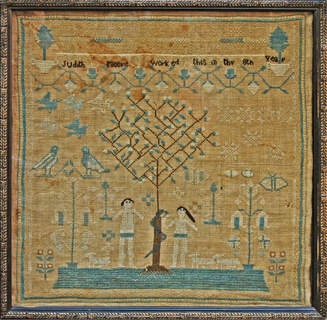 AMERICAN PICTORIAL NEEDLEWORK SAMPLER: ‘JUDITH MOORE WORKED THIS IN THY 8TH YEAR’; PHILADELPHIA SCHOOL, PENNSYLVANIA; CIRCA 1825. The pictorial needlework with Adam & Eve & tree with snake. Silk on linen; 16 x 16 inches.