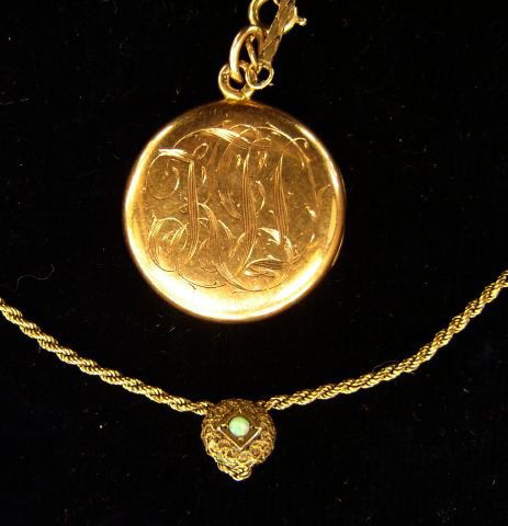 A lot of two gold chains one a watch chain and a p: A lot of two gold chains one a watch chain and a photo locket with a chain