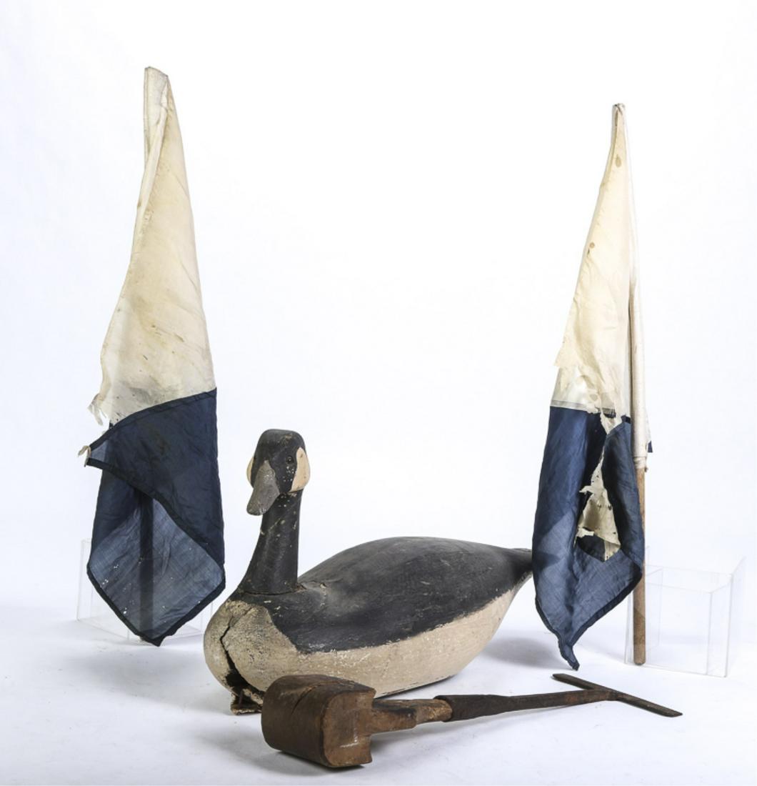 DECOY, HAND TOOL, PENNANTS LOT: LOT, 4 items 1) Decoy Canada Goose, head detached, body damaged. 22" long. 2) Hand tool, wood and iron. 3-4) 2 pennants