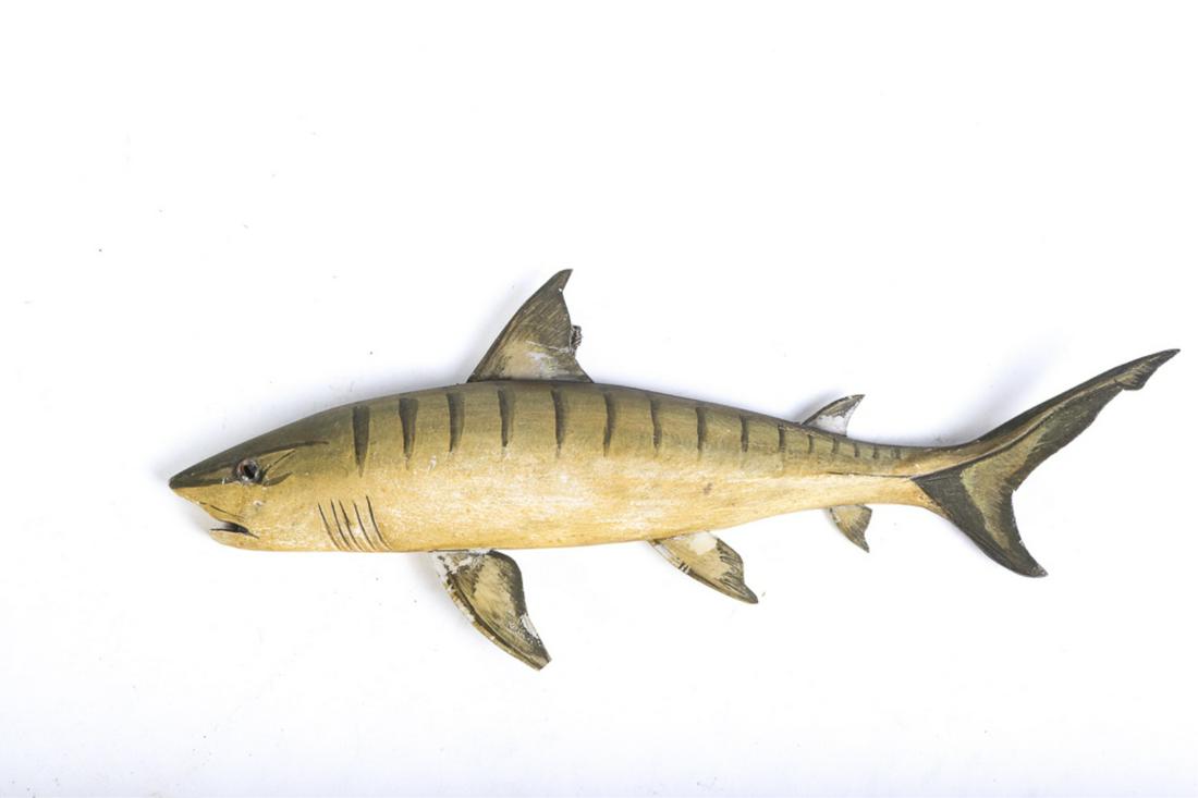 CARVED AND PAINTED WOODEN TIGER SHARK: Glass eye with painted synthetic dorsal and other fins. Tail fin is wood carved. unsigned. 12 1/4 inches.