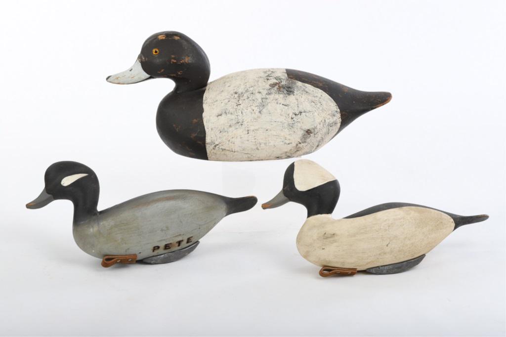 (2) PETE PETERSON DECOYS & A THIRD: 3 Decoys, 2 are signed "PETE". And are weighted. 3rd larger carved and painted with glass eyes. 14" long.2 are 12" long.