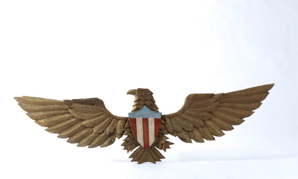 PRIMITIVE PATRIOTIC CARVED WOODEN EAGLE: Carved wood with shield. 40" X 12".
