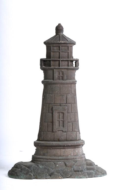 BRONZE LIGHTHOUSE-FORM DOORSTOP: Unmarked, 23 inches with naturally oxidized patina.