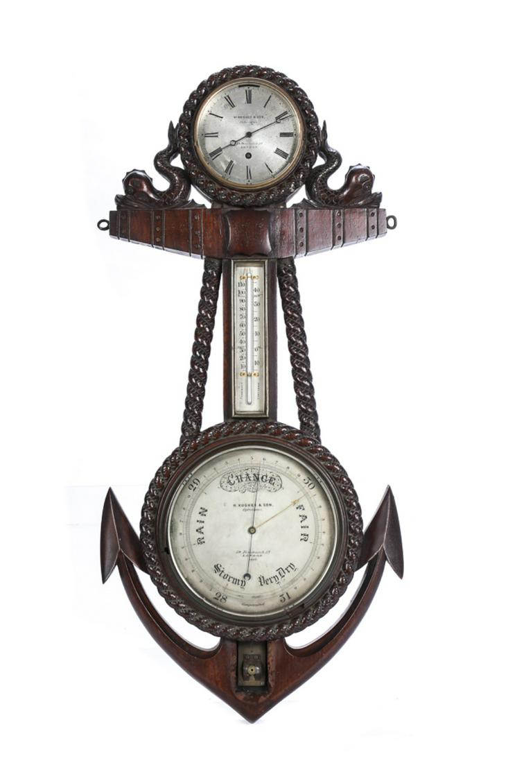 H. HUGHS & SON ANCHOR FORM INSTRUMENT: A finely carved nautical instrument, with clock, thermometer and barometer. Carved mahogany in the form of an anchor, with rope carving and a pair of dolphins on either side of the clock. Dials are si