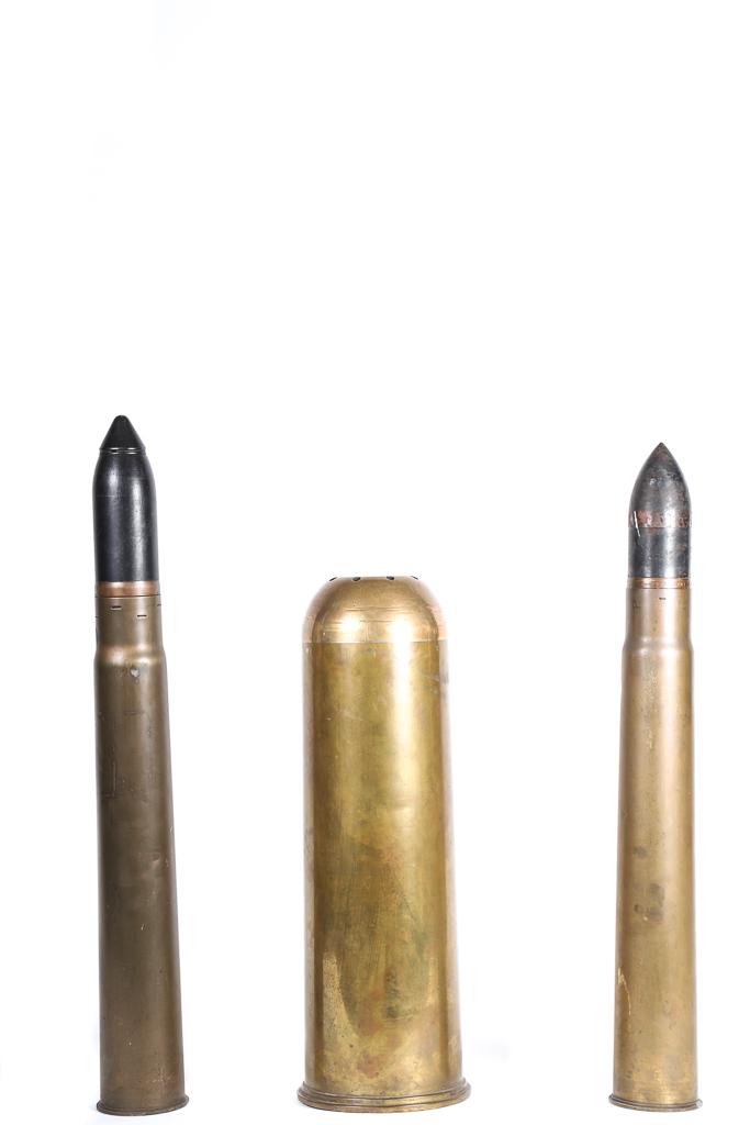 THREE BRASS PRACTICE ARTILLARY SHELLS: Included are are 75mm and dated 1941.