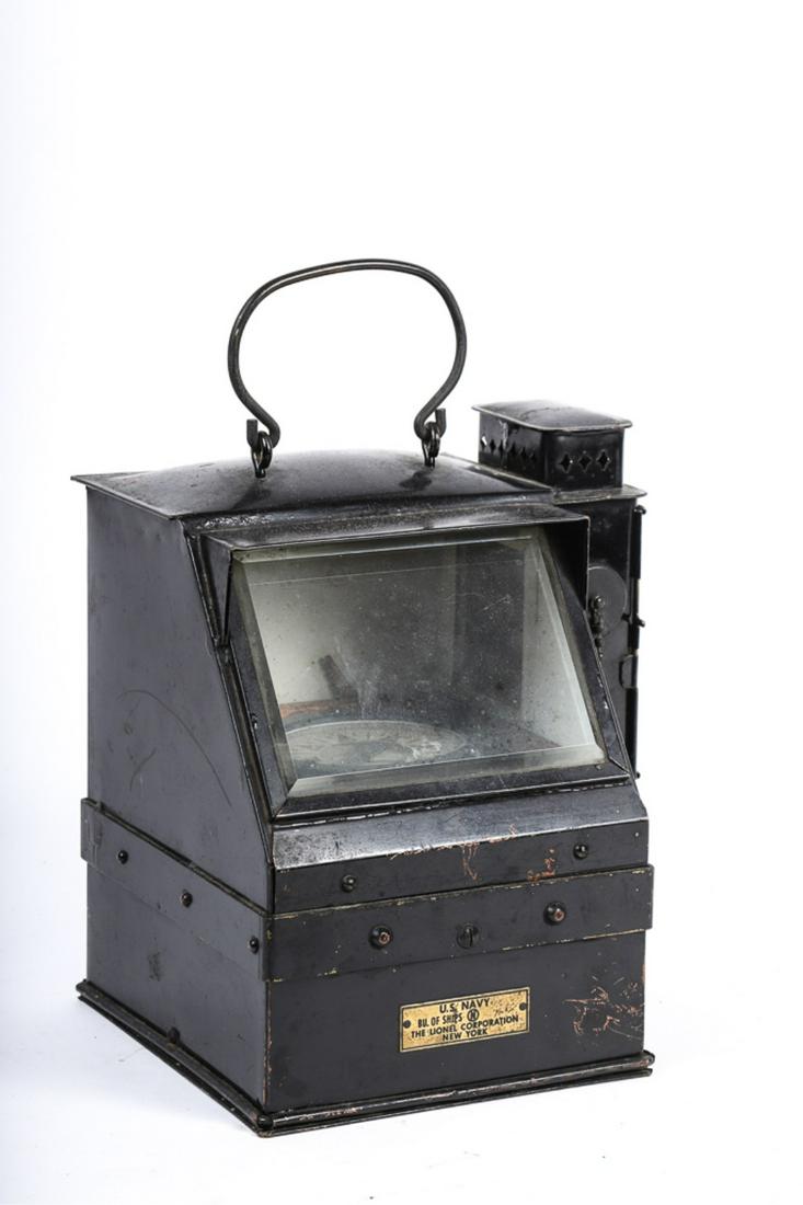 WWII LIONEL LIFE BOAT COMPASS BINNACLE: An exceptional US Navy binnacle used on life boats. Brass plaque reads “U.S. NAVY BU SHIPS - THE LIONEL CORP.”. Binnacle is complete, including the original light source, matches tray and reflecto